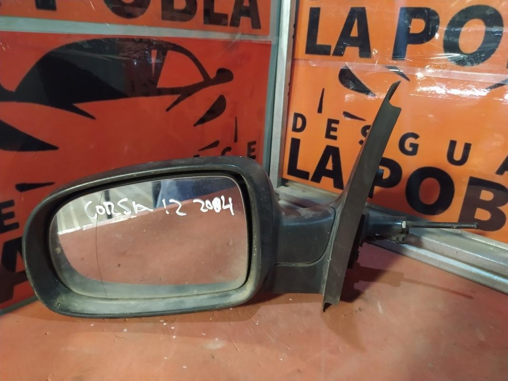 [11181115375686] Retrovisor izquierdo - Opel Corsa D 3-puertas (1.2i 16V ECOTEC (80 cv) Automatico) (2004)
